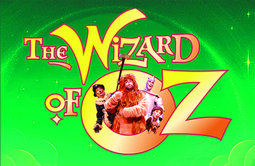 Wizard of Oz Logo that includes the four main characters, the Scarecrow, the Lion, the Tinman and Dorothy coming out of the logo. 